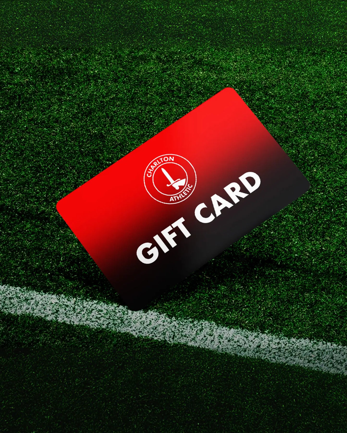 Red and black gift card with a logo and text on a green field background