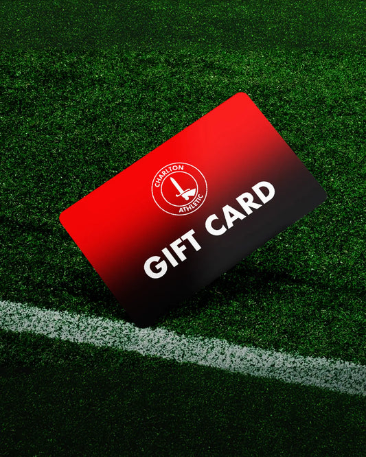 Red and black gift card with a logo and text on a green field background